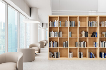 Modern library interior with wooden bookshelves and comfortable seating area. 3D Rendering
