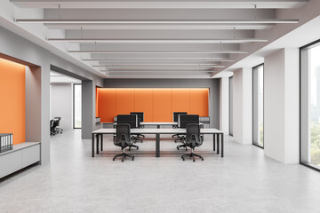 Modern open office space with contemporary design and bright orange accents. 3D Rendering