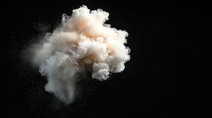 Abstract explosion of beige powder on black background. Potential use Stock photo for graphic design, scientific publications, or visual effect presentations