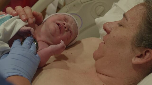 New Born Baby Checking Lungs and Heart