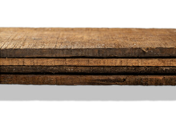 Closeup view of wood plank stack isolated over white background. Natural wooden texture
