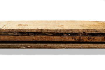 Closeup view of wood plank stack isolated over white background. Natural wooden texture