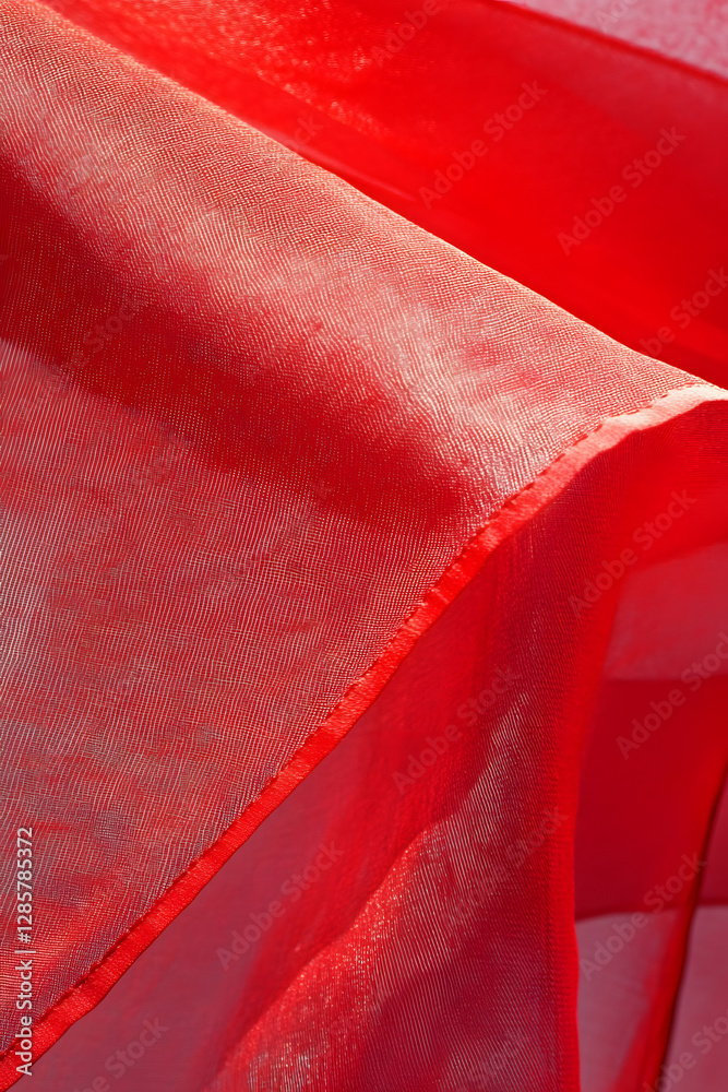 Poster vibrant red chiffon fabric close-up with delicate texture in sunlight : generative ai
