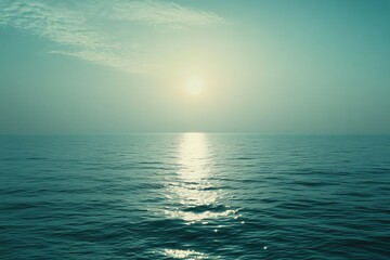 Obraz premium Tranquil ocean sunset with calm waves and serene horizon