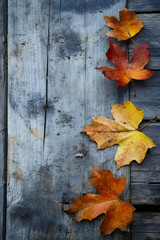 Obraz premium Autumn Leaves in Vibrant Colors on Rustic Wooden Background : Generative AI