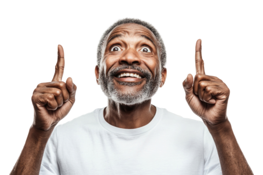 Elderly man celebrating with raised hands and joyful expression in a bright space