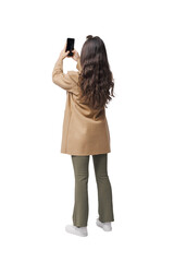 Young stylish woman taking pictures with her smartphone