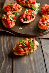 Bruschetta with with cherry tomatoes and basil
