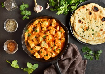 Delicious chicken tikka masala curry in cast iron skillet