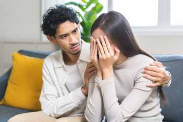 Anxiety depress, grief asian young couple comfort discuss concern encourage empathy and support,...