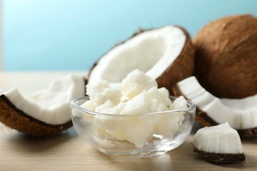 Bowl of coconut oil on table