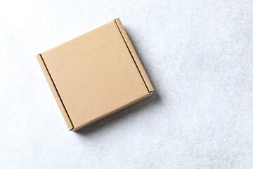 Carboard box on gray background