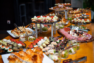 Colorful buffet assortment of canapes at an elegant event showcasing culinary artistry and creativity