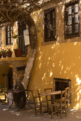 Shady taverna in old Chania, Crete