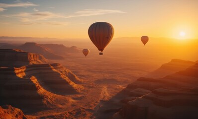Hot air balloons over desert landscape