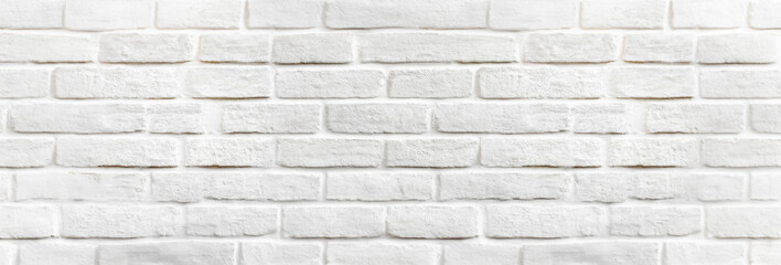 Obraz premium Panoramic background of wide white brick wall texture. Home or office design backdrop