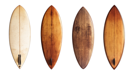 Collection of vintage wooden surfboards displaying unique craftsmanship