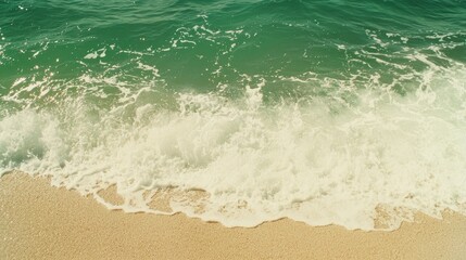 Gentle waves lapping on sandy beach, tranquil ocean scene