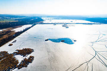 Rezerwat przyrody Łężczok – wodny rezerwat przyrody w województwie śląskim, w powiecie raciborskim. Panorama w zimie z lotu ptaka. © Franciszek