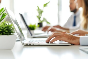 People working together on computers, great for corporate or team-related images