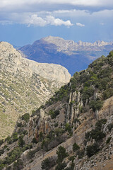 The mountain panorama opening from the hiking path to pick Puig Campana, Finestrat, Benidorm, Spain