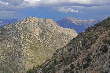 Fototapeta premium The mountain panorama opening from the hiking path to pick Puig Campana, Finestrat, Benidorm, Spain