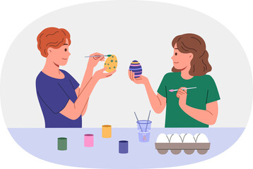 Children paint easter eggs in preparation for main christian holiday, standing at table with gouache and brushes. Celebrations easter in orthodox and catholic culture, on day of resurrection jesus