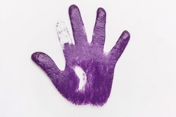 A close-up of a purple hand leaving a print on a white surface