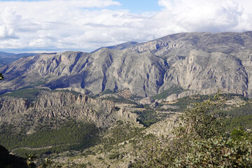 The mountain panorama opening from the hiking path to pick Puig Campana, Finestrat, Benidorm, Spain