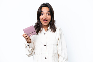 Young hispanic woman holding wallet isolated on white background with surprise facial expression