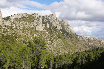 The mountain panorama opening from the hiking path to pick Puig Campana, Finestrat, Benidorm, Spain