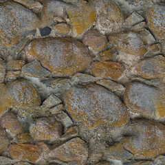 An old stone wall. Background of grey stones. Stone texture. Grey stones. Seamless.
