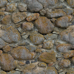 An old stone wall. Background of grey stones. Stone texture. Seamless.