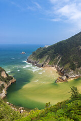 Typical landscape with Playa del Sable near Pesues, Cantabria, Spain