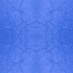 Obraz premium An old blue wall with cracks. Blue vintage background with damage. Blue texture. Seamless, symmetrical texture.