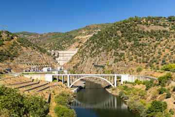 Tua river with dam and bridge