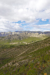  The mountain panorama opening from the hiking path to pick Puig Campana, Finestrat, Benidorm, Spain