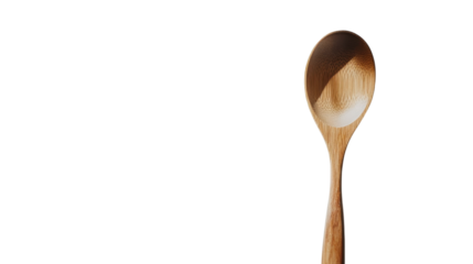 Wooden spoon resting against a plain white background, showcasing its natural grain and craftsmanship details for culinary enthusiasts