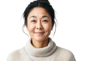 Smiling middle-aged woman in a cozy sweater with a warm expression in a bright setting