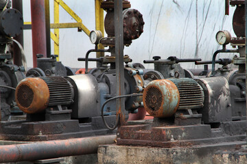 Series of pipes, valves and pumps transfering hot dangerous materials on a coke making works.