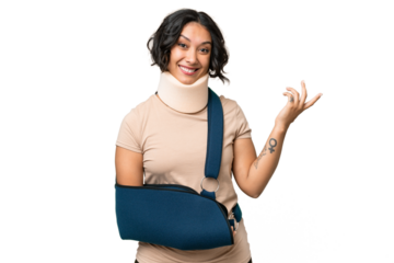 Young argentinian woman wearing neck brace and sling over isolated background extending hands to the side for inviting to come