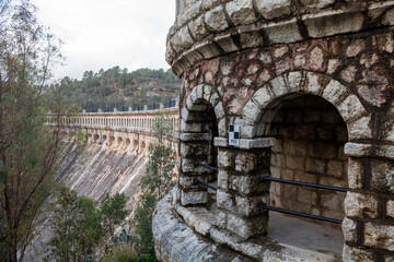 Historic arch dam of Embalse del Conde de Guadalhorce in Malaga, Spain