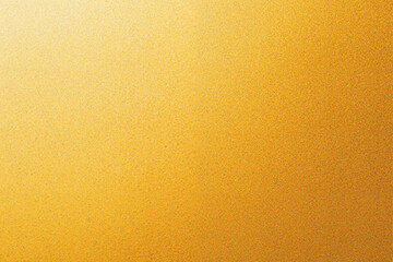 Fototapeta premium Abstract golden texture: gradient surface with grainy, shimmering details, catching light and shadow.