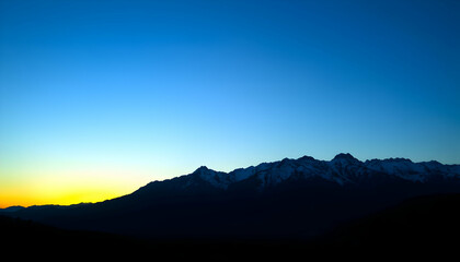 Fototapeta premium Serene Sunset Mountain Range Landscape Dramatic View Breathtaking Scenery Nature Photography Peaceful Twilight Horizon