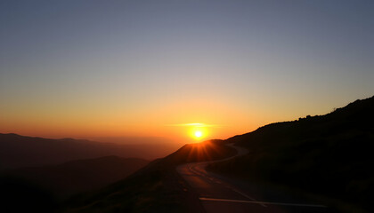 Majestic Sunset Over Winding Mountain Road Scenic Landscape