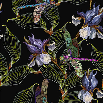 Blue irises flowers and dragonflies seamless pattern. Embroidery. Summer garden concept. Fashion art nouveau template for clothes, t-shirt design