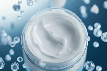 Moisturizing cream in a glass jar surrounded by water droplets on a blue surface creating a serene ambiance. Generative AI