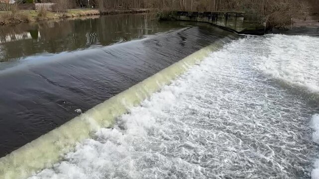 Water flows down a weir slow-motion