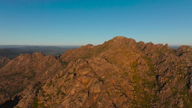 Granite Mountains At Sunset In O Pindo, Carnota, Spain. Aerial Pullback Shot
