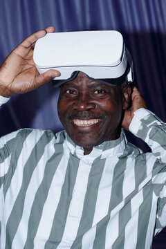 Smiling African American Man Wearing Virtual Reality Headset